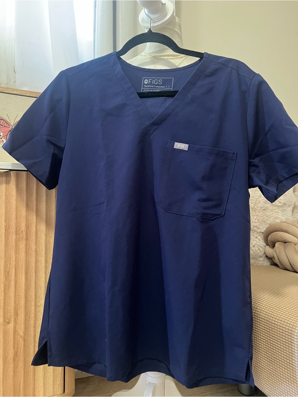 FIGS women’s Catarina Scrub Top in Navy Blue